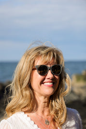 Made with a sustainable speckled wheatstraw or coffee residue frame and walnut wood temples, it's lightweight, comfortable and eco-friendly. Available in charcoal, olive green, coffee and mint frames and fitted with UV400 polarised lenses in smoke, mirrored rose pink and mirrored honey, they are a natural, biodegradable alternative to plastic sunglasses.