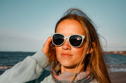 Made with a sustainable speckled wheatstraw or coffee residue frame and walnut wood temples, it's lightweight, comfortable and eco-friendly. Available in charcoal, olive green, coffee and mint frames and fitted with UV400 polarised lenses in smoke, mirrored rose pink and mirrored honey, they are a natural, biodegradable alternative to plastic sunglasses.