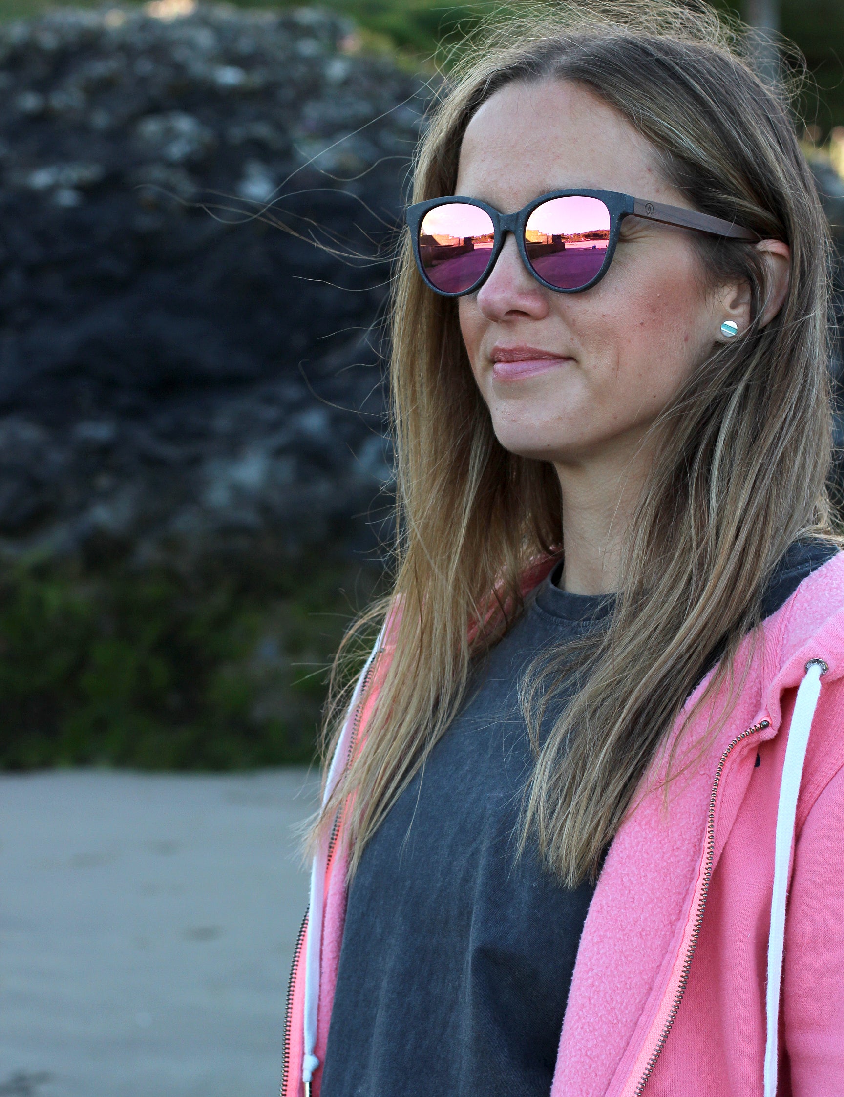 Made with a sustainable speckled wheatstraw or coffee residue frame and walnut wood temples, it's lightweight, comfortable and eco-friendly. Available in charcoal, olive green, coffee and mint frames and fitted with UV400 polarised lenses in smoke, mirrored rose pink and mirrored honey, they are a natural, biodegradable alternative to plastic sunglasses.