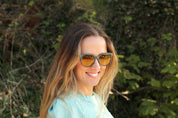 Made with a sustainable speckled wheatstraw or coffee residue frame and walnut wood temples, it's lightweight, comfortable and eco-friendly. Available in charcoal, olive green, coffee and mint frames and fitted with UV400 polarised lenses in smoke, mirrored rose pink and mirrored honey, they are a natural, biodegradable alternative to plastic sunglasses.