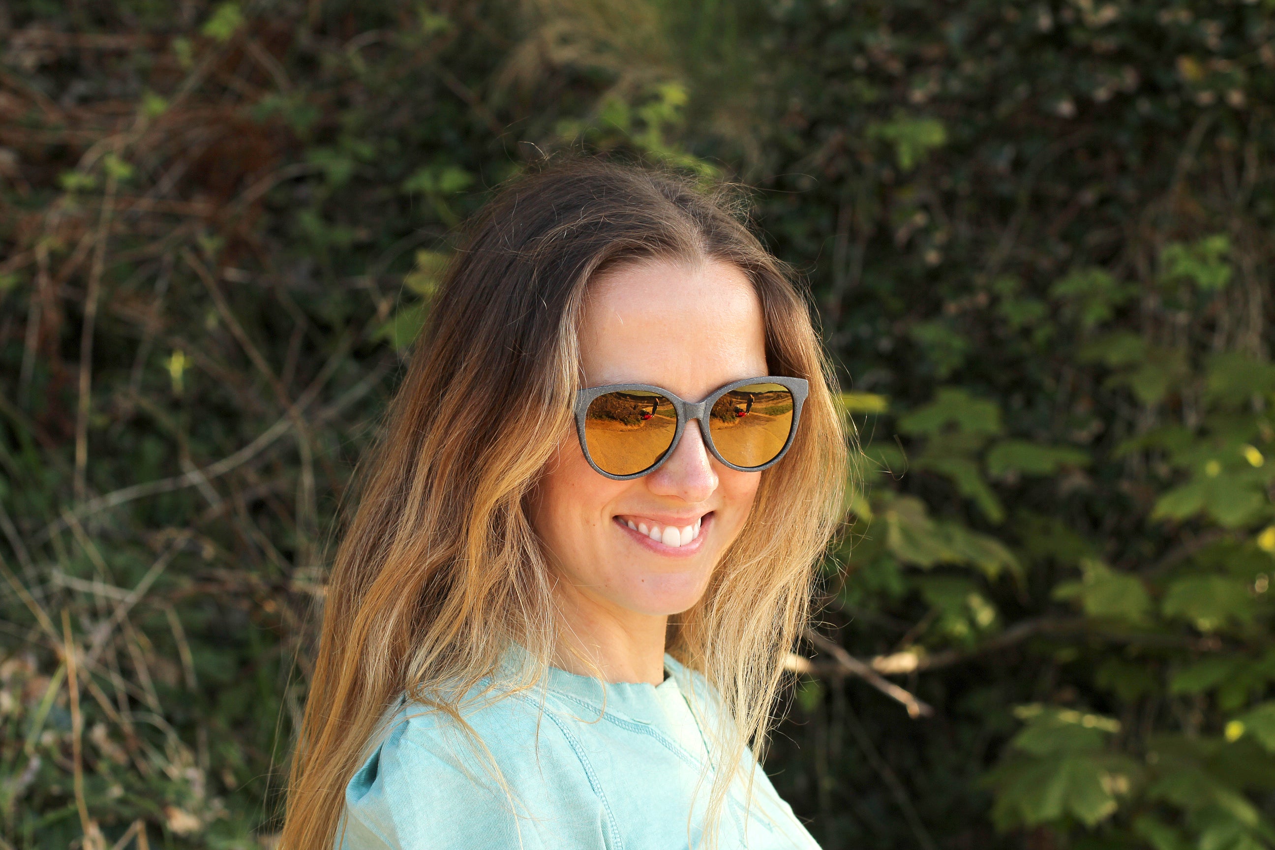 Made with a sustainable speckled wheatstraw or coffee residue frame and walnut wood temples, it's lightweight, comfortable and eco-friendly. Available in charcoal, olive green, coffee and mint frames and fitted with UV400 polarised lenses in smoke, mirrored rose pink and mirrored honey, they are a natural, biodegradable alternative to plastic sunglasses.