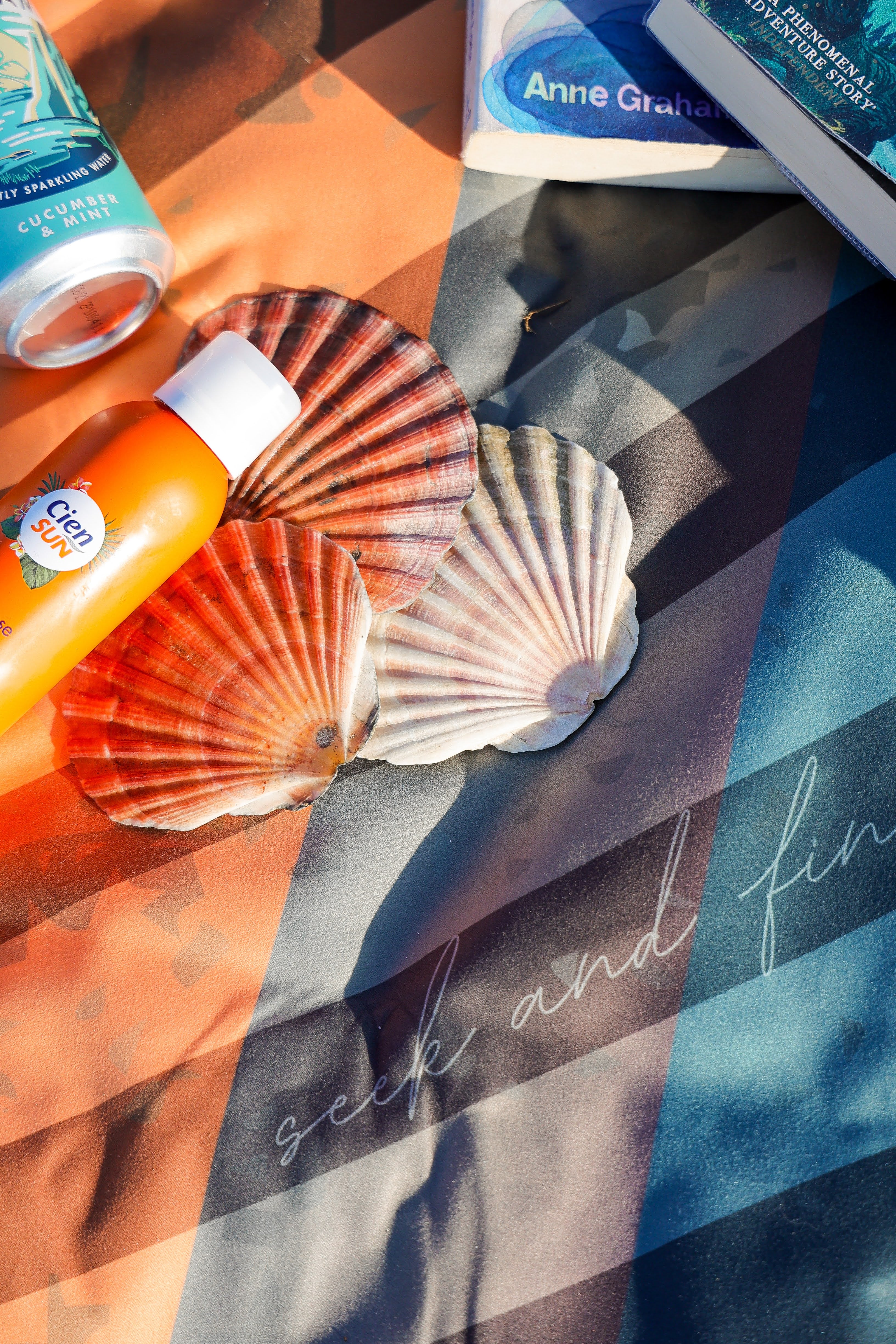 Sustainable waterproof picnic blanket made from recycled polyester, oversized yet packable as it folds flat into a laptop size to slide into a backpack. Zip corner pocket and stake loops and sand pockets to keep it in place. 