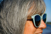 Made with a sustainable speckled wheatstraw or coffee residue frame and walnut wood temples, it's lightweight, comfortable and eco-friendly. Available in charcoal, olive green, coffee and mint frames and fitted with UV400 polarised lenses in smoke, mirrored rose pink and mirrored honey, they are a natural, biodegradable alternative to plastic sunglasses.