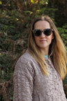 Made with a sustainable speckled wheatstraw or coffee residue frame and walnut wood temples, it's lightweight, comfortable and eco-friendly. Available in charcoal, olive green, coffee and mint frames and fitted with UV400 polarised lenses in smoke, mirrored rose pink and mirrored honey, they are a natural, biodegradable alternative to plastic sunglasses.