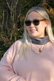A classic soft rectangular frame. Made with a sustainable speckled charcoal wheatstraw or coffee residue frame and walnut wood temples, it's lightweight and comfortable offering the highest protection with UV400 polarised lenses in a smoke black colour or mirror sky blue. Eco-friendly using plastic alternative frames t…